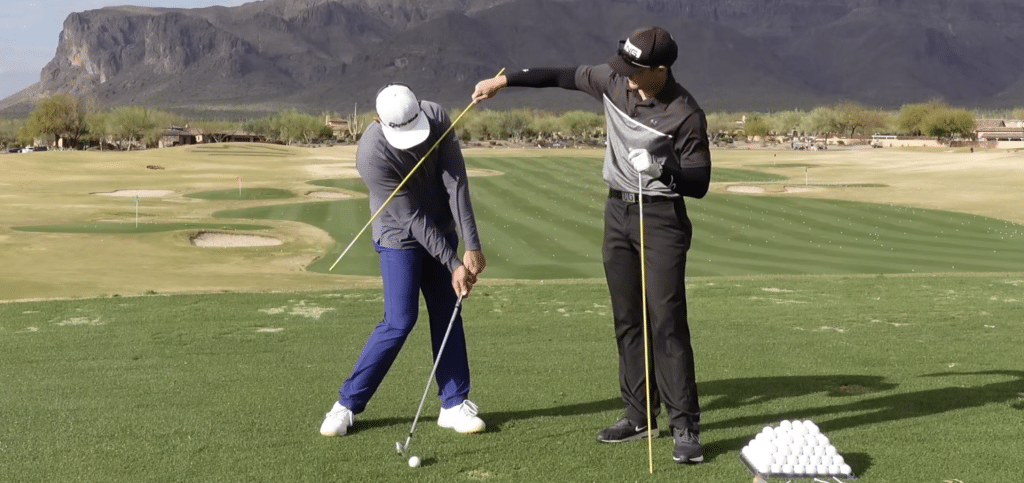 Milo Lines and Henry Fall show how chest rotation can greatly reduce chunk shots in golf.